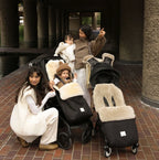 Fußsack Puffmuff® - Merino Lammfell - Noir + Milk - BINIBAMBA