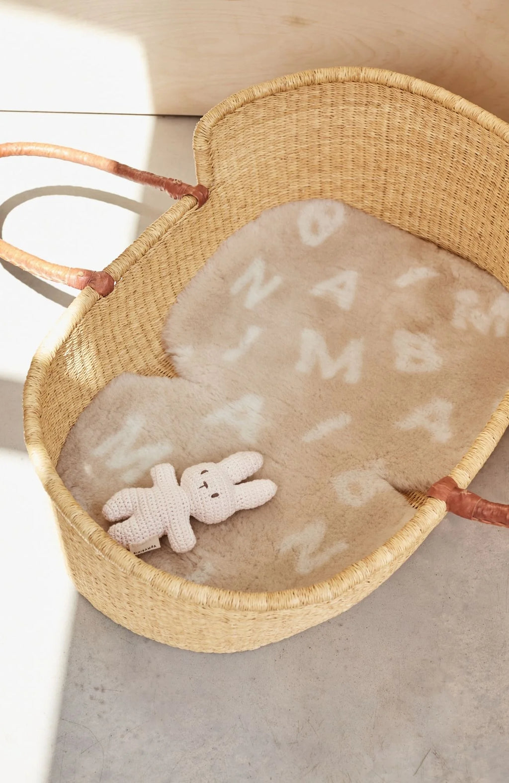 Merinowoll-Kinderwagenauflage Snuggler® - Alphabet - BINIBAMBA