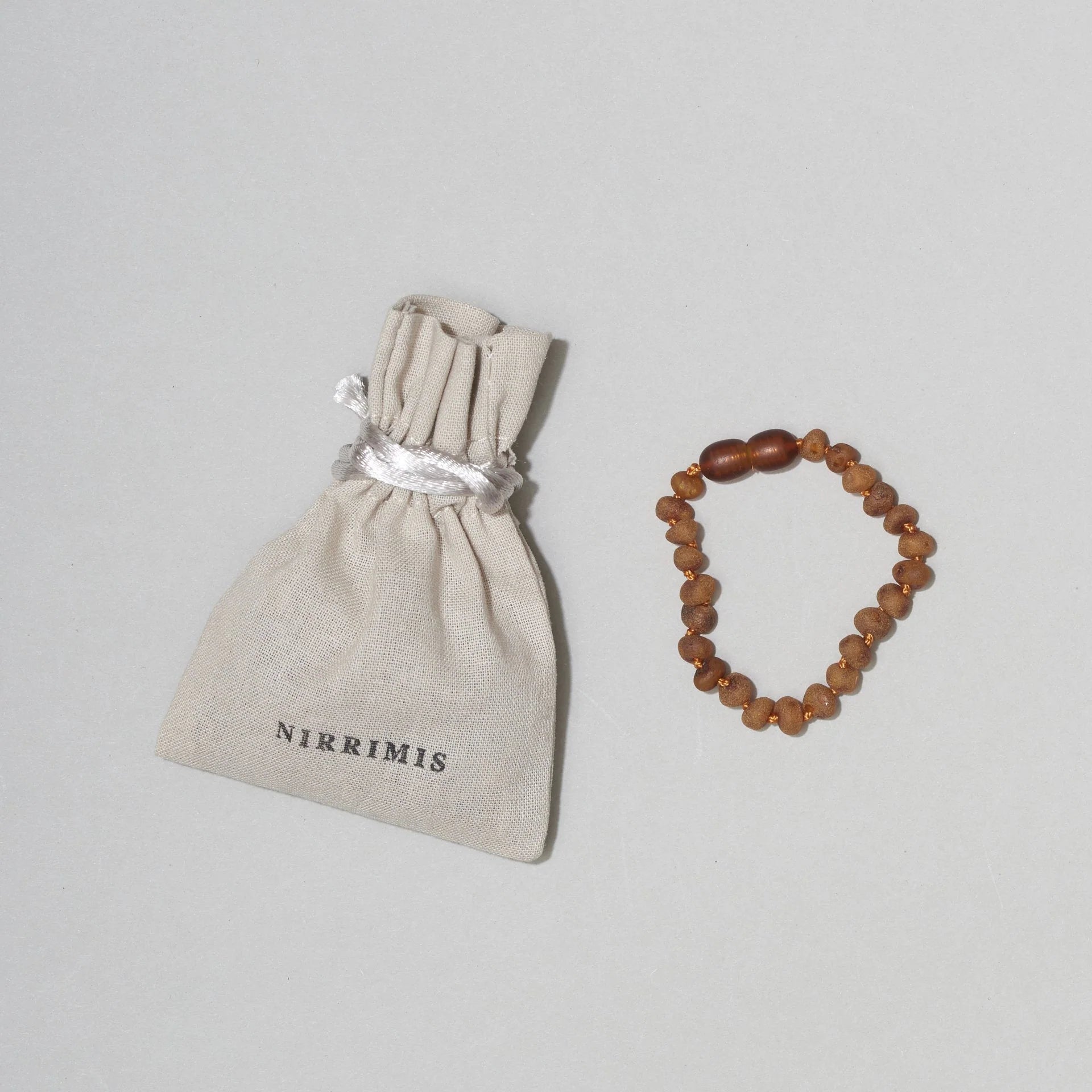 Barnsteen armband Raw Caramel Amber - 14 cm - Nirrimis - productfoto