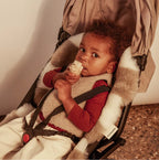 Merino wollen kinderwagen inleg Snuggler® - White Toastie - BINIBAMBA