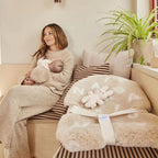Merinowoll-Kinderwagenauflage Snuggler® - Alphabet - BINIBAMBA