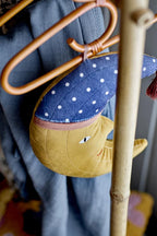 Aranya Hanger Nature – Bloomingville MINI: detail of a hanger on a wooden clothes rack.